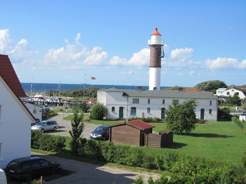 Ferienhaus Lütt Deern - Blick aus oberem Wohnzimmer auf Leuchtturm